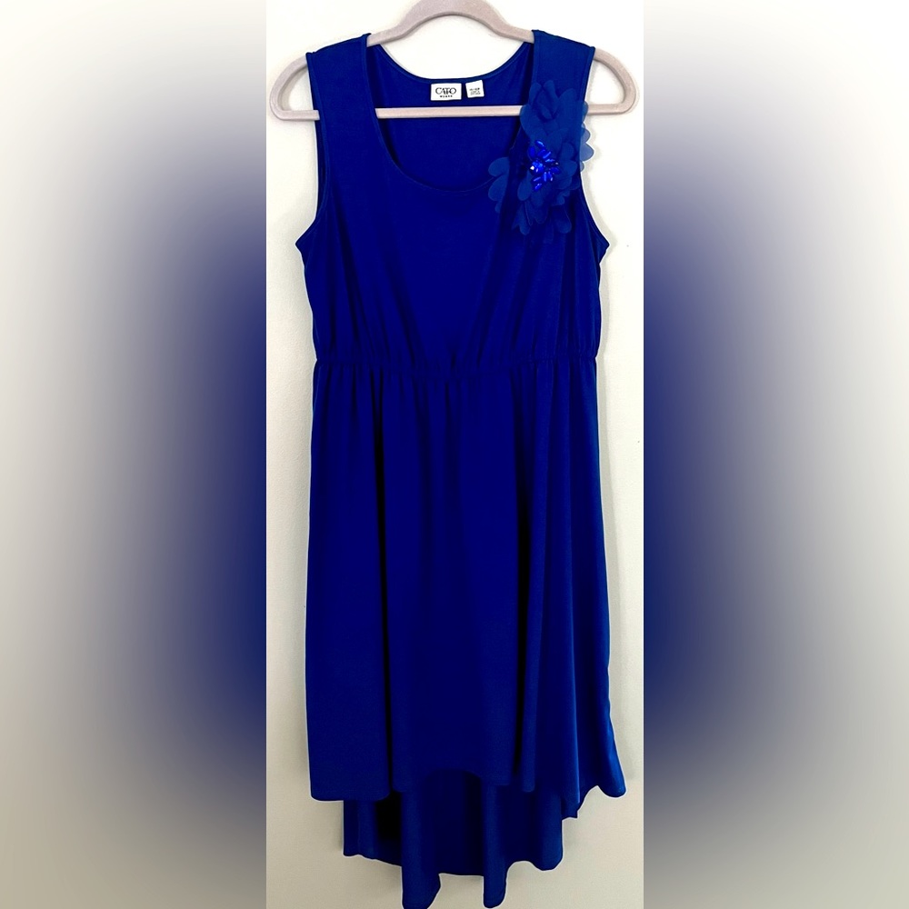 Cute bright blue dress.